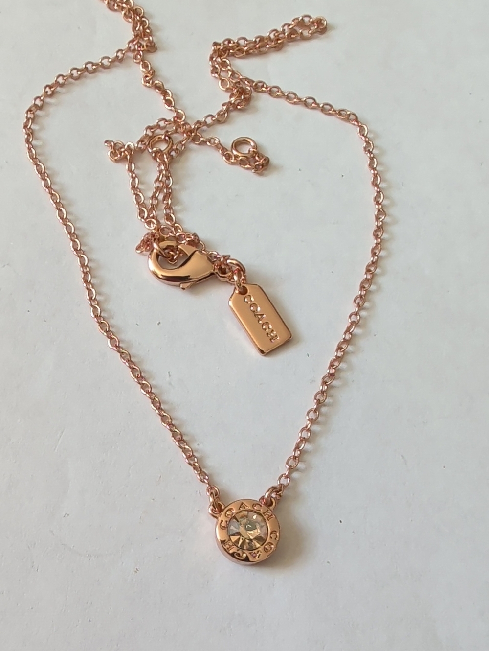 Coach Rose Gold Crystal Accent Pendant Necklace
